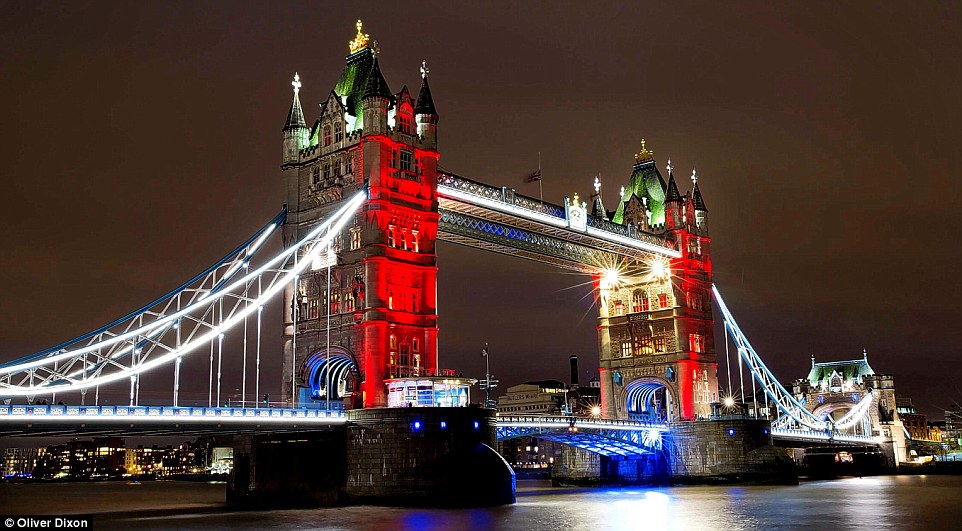 2E7249EA00000578-3318549-Tower_Bridge_is_lit_up_in_the_colours_of_the_French_flag_as_a_vi-a-35_1447544875722